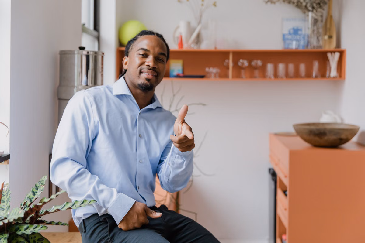 Portrait of a WellnessVault team member in a modern office